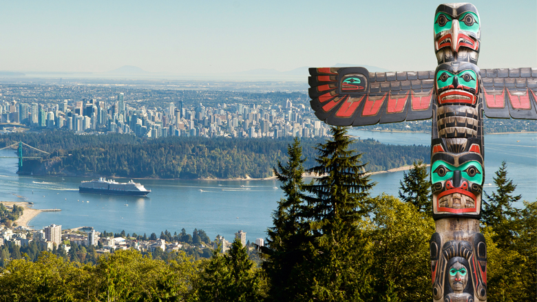 View of B.C. Canada with Totem Pole in foreground